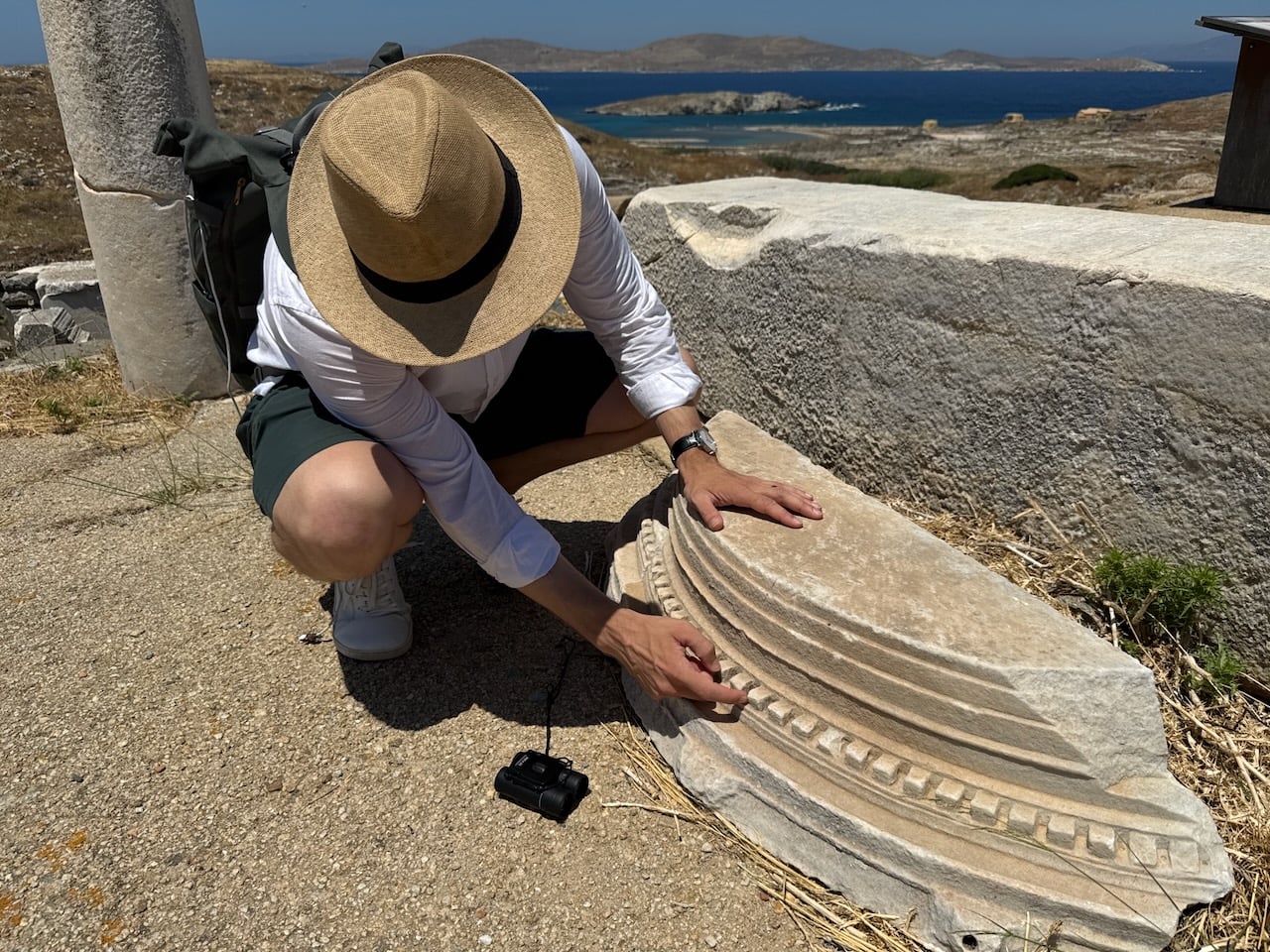 Rick over a fallen marble moulding on Delos